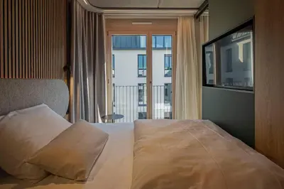 Ein Bett oder Betten in einem Zimmer der Unterkunft B5 Apartments