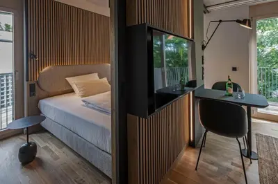 Ein Bett oder Betten in einem Zimmer der Unterkunft B5 Apartments