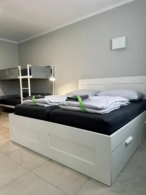 Ein Bett oder Betten in einem Zimmer der Unterkunft Neuwertiges Apartment mit schnellem WLAN, Glasfaser, Kostenlose Privatparkplatz auch für Transporter geeignet R24