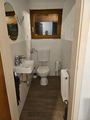 Ein Badezimmer in der Unterkunft T&G WirthHaus