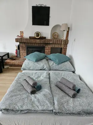 Ein Bett oder Betten in einem Zimmer der Unterkunft T&G WirthHaus
