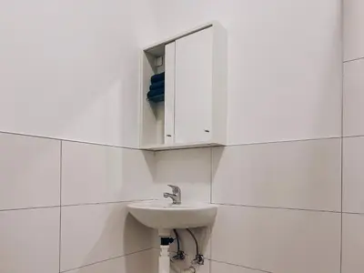 Ein Badezimmer in der Unterkunft Neuwertiges Apartment mit schnellem WLAN, Glasfaser, Kostenlose Privatparkplatz auch für Transporter geeignet R23