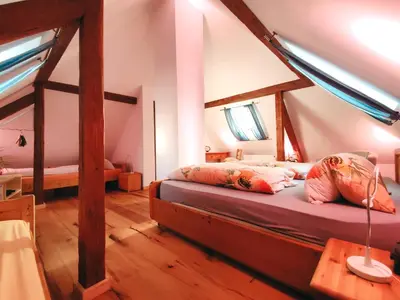 Ein Bett oder Betten in einem Zimmer der Unterkunft Charmantes Turmzimmer