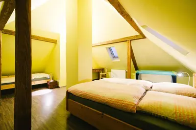 Ein Bett oder Betten in einem Zimmer der Unterkunft Charmantes Turmzimmer
