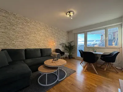 Ein Sitzbereich in der Unterkunft Zentrales 2-Zi Apartment by Rabe - Historische Kirche, Smart-TV, Netflix