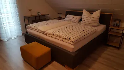 Ein Bett oder Betten in einem Zimmer der Unterkunft Ferienhaus Fee