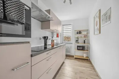 Küche/Küchenzeile in der Unterkunft Amalfi A02 - 2 Zi für 4P - Balkon, smart TV, Boxspringbett