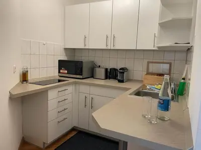 Küche/Küchenzeile in der Unterkunft Appartio: Studio-Appartement am Stadtrand