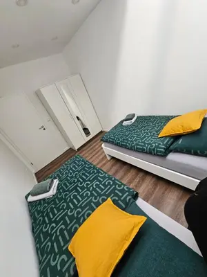 Ein Bett oder Betten in einem Zimmer der Unterkunft Ferienwohnung Eule