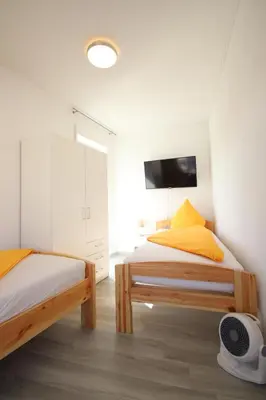 Ein Bett oder Betten in einem Zimmer der Unterkunft Apartments/Wohnungen direkt in Aschaffenburg
