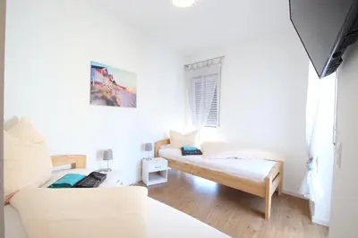 Ein Bett oder Betten in einem Zimmer der Unterkunft Apartments/Wohnungen direkt in Aschaffenburg