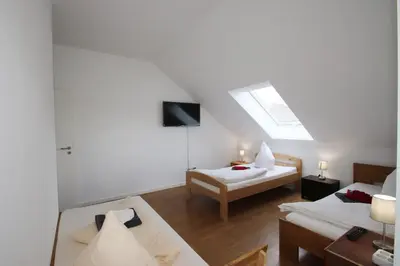 Ein Bett oder Betten in einem Zimmer der Unterkunft Apartments/Wohnungen direkt in Aschaffenburg