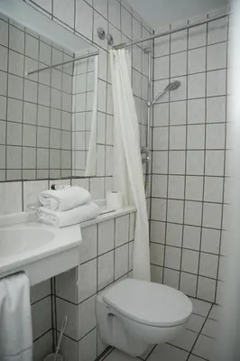 Ein Badezimmer in der Unterkunft Weber Residenz