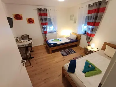 Ein Bett oder Betten in einem Zimmer der Unterkunft APARTMENTS / WOHNUNG IN HAIBACH