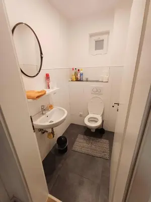 Ein Badezimmer in der Unterkunft APARTMENTS / WOHNUNG IN HAIBACH
