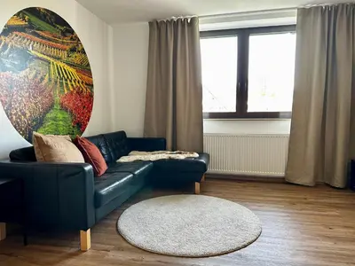 Ein Sitzbereich in der Unterkunft SPEYERBACH - modernes Apartment nahe Neustadter Innenstadt