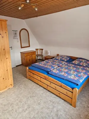 Ein Bett oder Betten in einem Zimmer der Unterkunft Naturfreundehaus