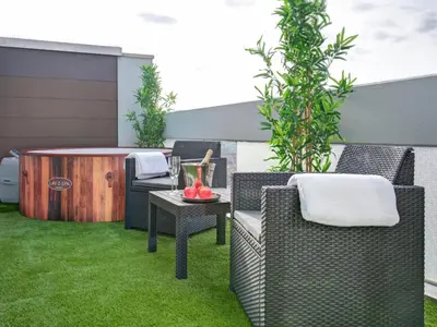 Ein Sitzbereich in der Unterkunft Das Penthouse - Jacuzzi - BBQ - Dachterrasse