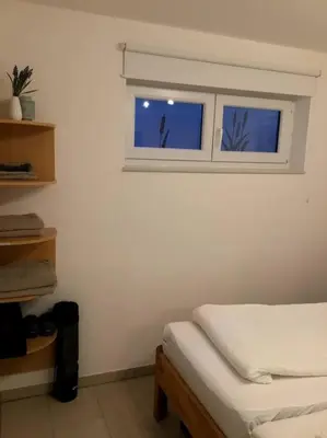 Ein Bett oder Betten in einem Zimmer der Unterkunft Wohnung in gehobener Lage