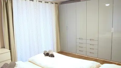 Ein Bett oder Betten in einem Zimmer der Unterkunft Wohnung mit Sauna, Garten & Schwimmteich