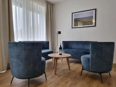 Ein Sitzbereich in der Unterkunft Gästehaus und Weingut Erich Hirth