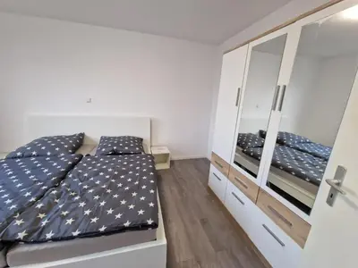 Ein Bett oder Betten in einem Zimmer der Unterkunft Ferienwohnung - klein aber fein