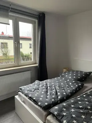 Ein Bett oder Betten in einem Zimmer der Unterkunft Ferienwohnung - klein aber fein