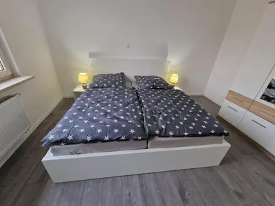 Ein Bett oder Betten in einem Zimmer der Unterkunft Ferienwohnung - klein aber fein