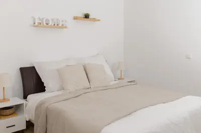 Ein Bett oder Betten in einem Zimmer der Unterkunft Ferienwohnung Rheinauen