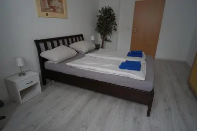 Ein Bett oder Betten in einem Zimmer der Unterkunft Heidelberg Apartments