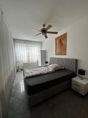 Ein Bett oder Betten in einem Zimmer der Unterkunft Heidelberg Apartments