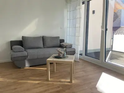 Ein Sitzbereich in der Unterkunft Ferienwohnung im Weingut Jens Griebel
