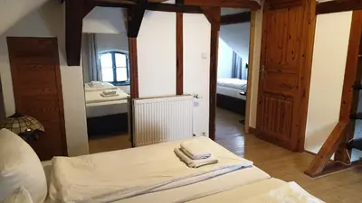 Ein Bett oder Betten in einem Zimmer der Unterkunft Gästehaus Zu Herrenwiesen