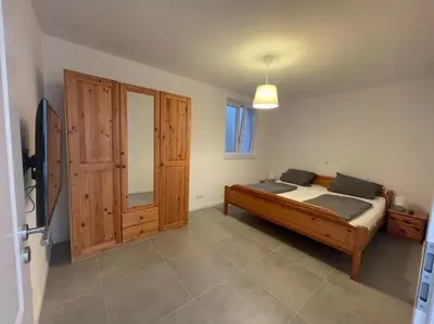 Ein Bett oder Betten in einem Zimmer der Unterkunft Ferienwohnung Kissel in den Weinbergen