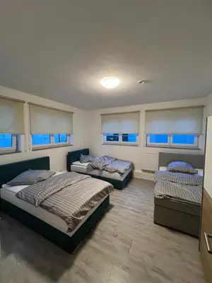 Ein Bett oder Betten in einem Zimmer der Unterkunft City Unterkunft 1