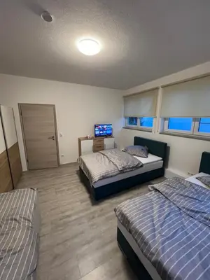 Ein Bett oder Betten in einem Zimmer der Unterkunft City Unterkunft 1