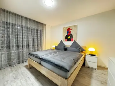Ein Bett oder Betten in einem Zimmer der Unterkunft Big-Barockstadtapartment Rastatt