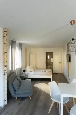 Ein Sitzbereich in der Unterkunft HUGOS Studio Apartment