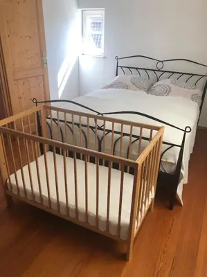 Ein Bett oder Betten in einem Zimmer der Unterkunft Ferienwohnung Zeitlos