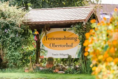 Ein Zertifikat, Auszeichnung, Logo oder anderes Dokument, das in der Unterkunft Ferienhof Obertor Brennerei ausgestellt ist