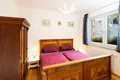 Ein Bett oder Betten in einem Zimmer der Unterkunft Ferienhof Obertor Brennerei