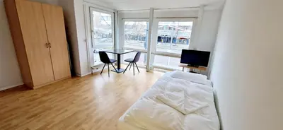 Ein Bett oder Betten in einem Zimmer der Unterkunft Apartments EFDE GmbH