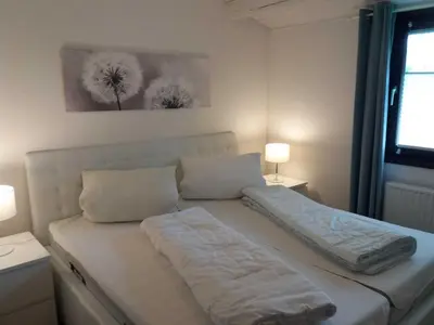Ein Bett oder Betten in einem Zimmer der Unterkunft Ferienhaus Robinson Am Krappennest 92