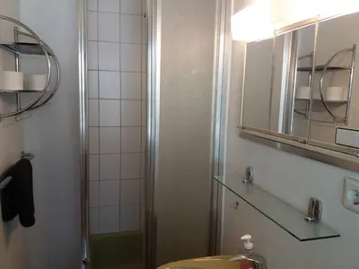 Ein Badezimmer in der Unterkunft Ferienhaus Robinson Am Krappennest 92