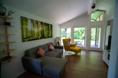 Ein Sitzbereich in der Unterkunft Ferienhaus Robinson Crusoe Schwarzkittelpfad 80