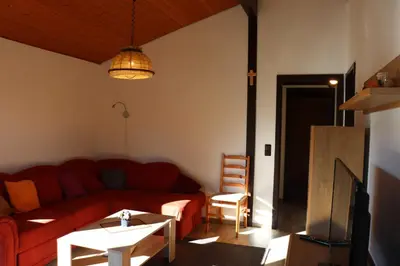 Ein Sitzbereich in der Unterkunft Ferienhaus Robinson Im Abendrot 123