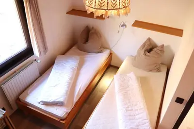 Ein Bett oder Betten in einem Zimmer der Unterkunft Ferienhaus Robinson Im Abendrot 123
