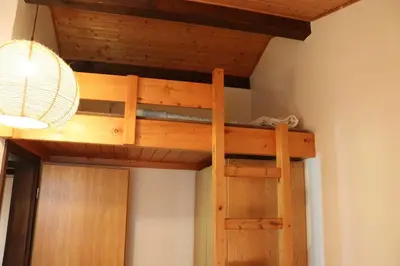 Ein Etagenbett oder Etagenbetten in einem Zimmer der Unterkunft Ferienhaus Robinson Romantikpfad 162