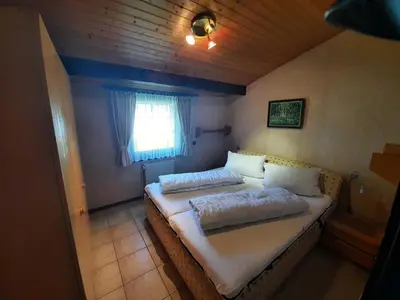 Ein Bett oder Betten in einem Zimmer der Unterkunft Ferienhaus Robinson Romantikpfad 164