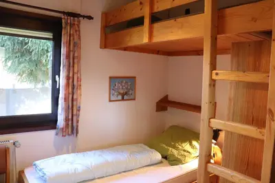 Ein Bett oder Betten in einem Zimmer der Unterkunft Ferienhaus Scout Paradiesecke 179